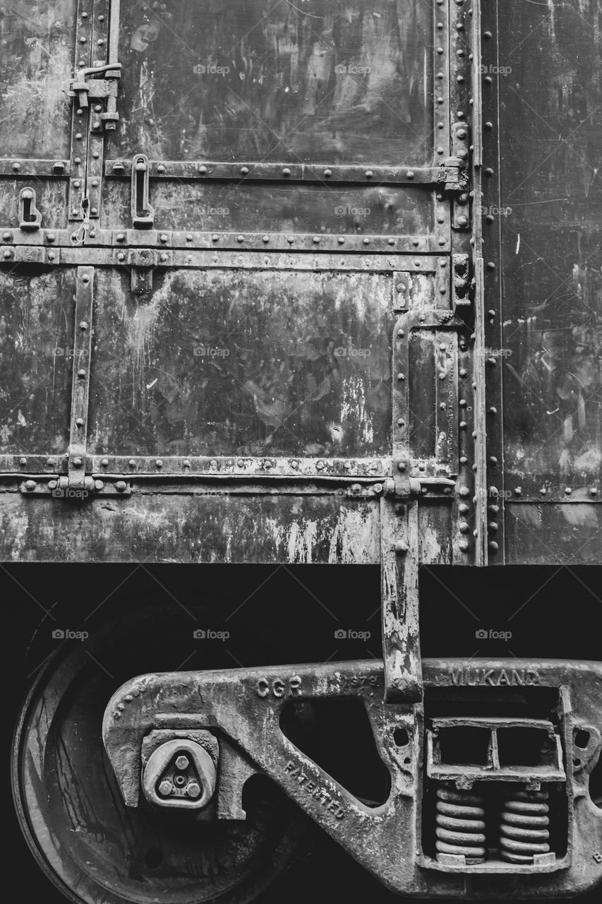 carrying the weight around the nation. railway carriage parked at the railway station. Old, vintage, rail road cargo carrier at Anuradhapura railway station, Sri Lanka.