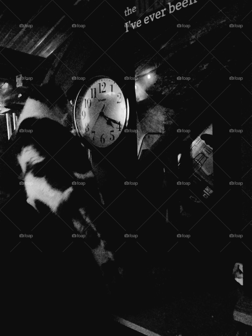 Watching time,  our kitten watching the second hand pin the clock.