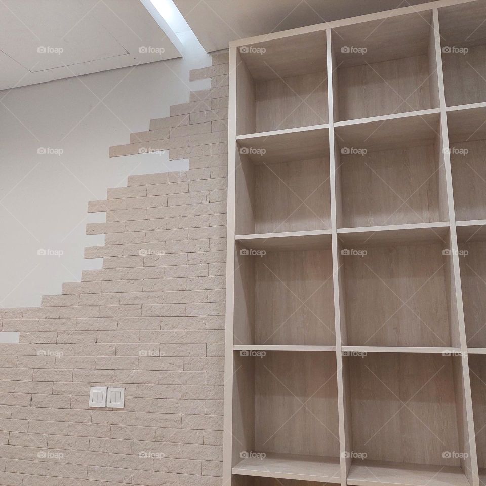 storage shelves for goods made of wood for visitors