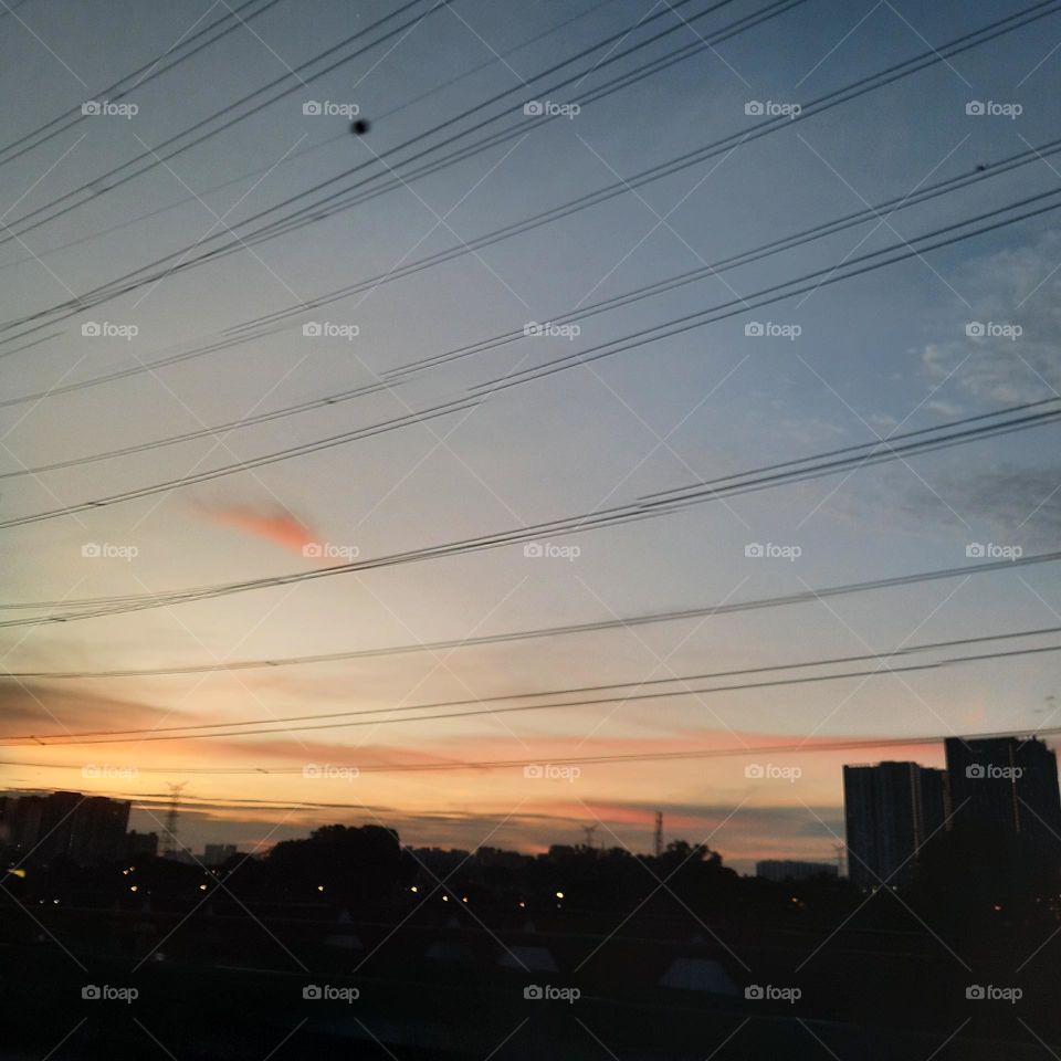 sunset sky orange blue sky electric line wire