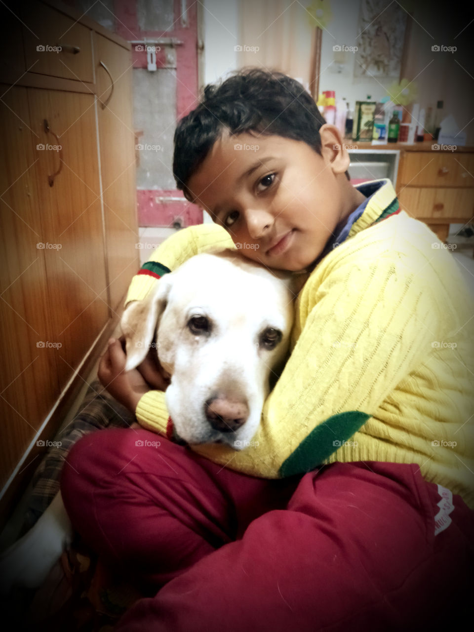 child and pet have unique unmatched bonding of love which can't be defined in words,for them both are same species knowi