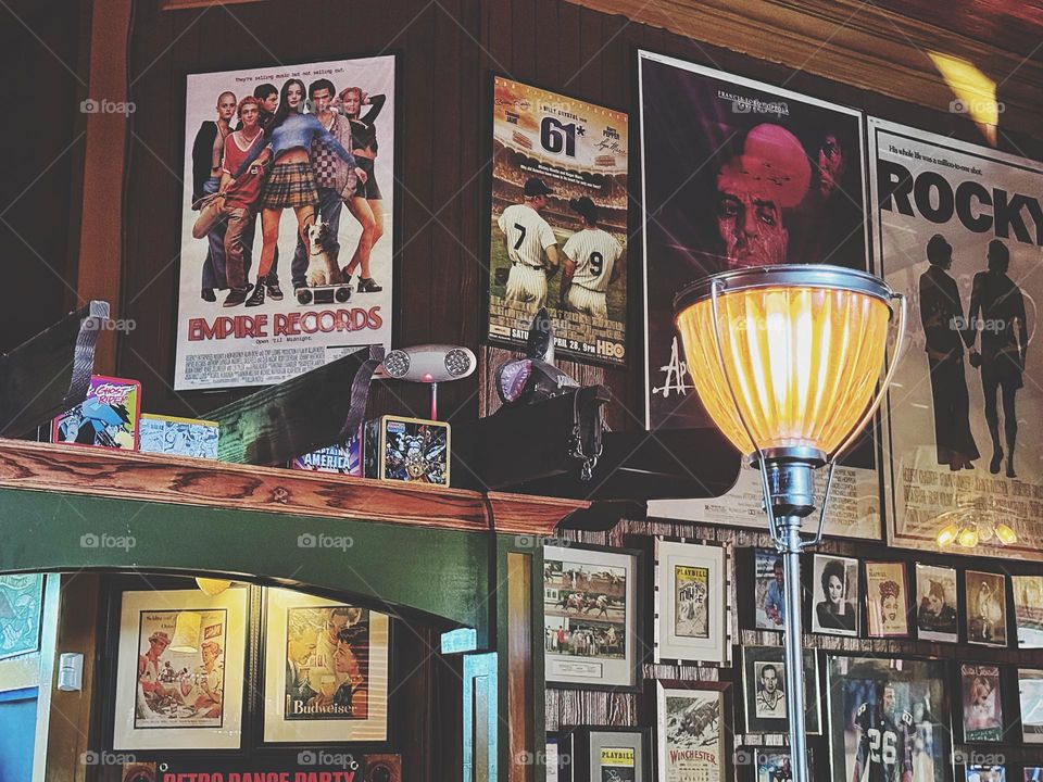 Movie posters and memorabilia at a bar 