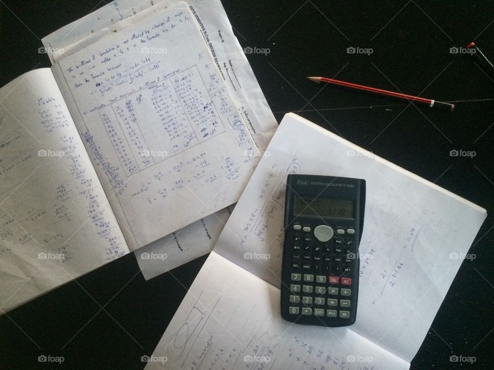 Exams and calculations and here a calculator and 2 books are therefore studying