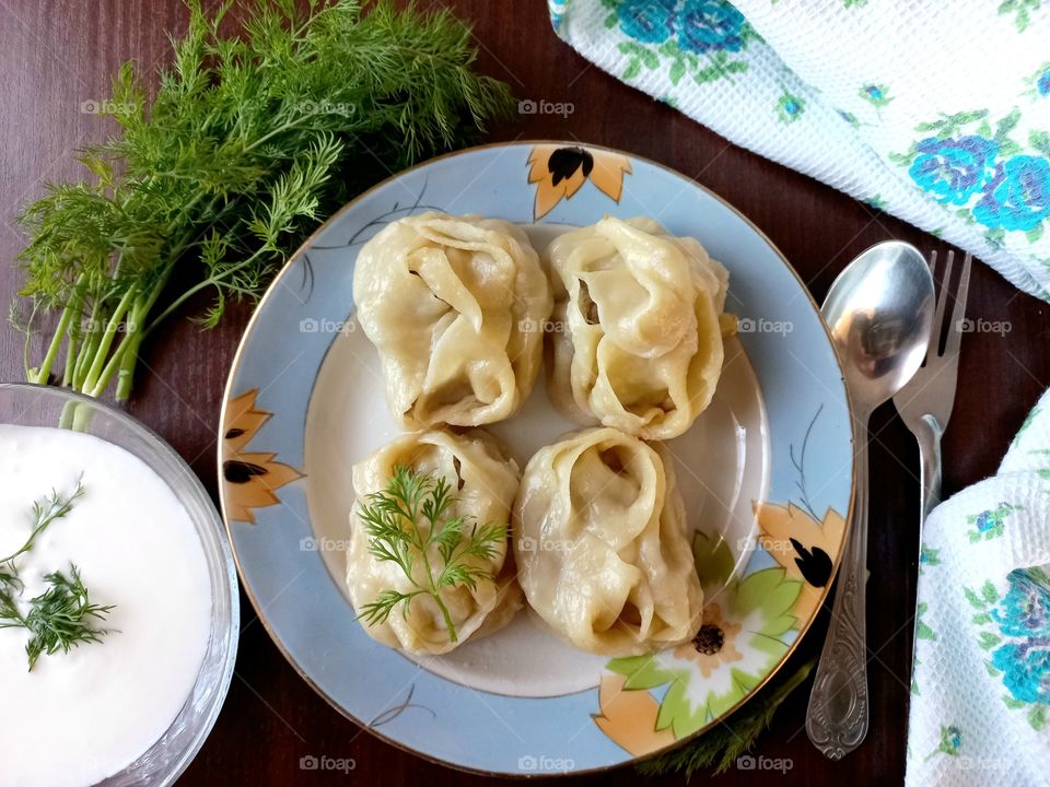 for lunch there were minced beef manti with onions, kefir and greens were also served with nim!