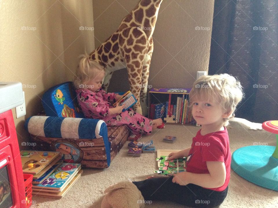 Twins spending Saturday morning reading