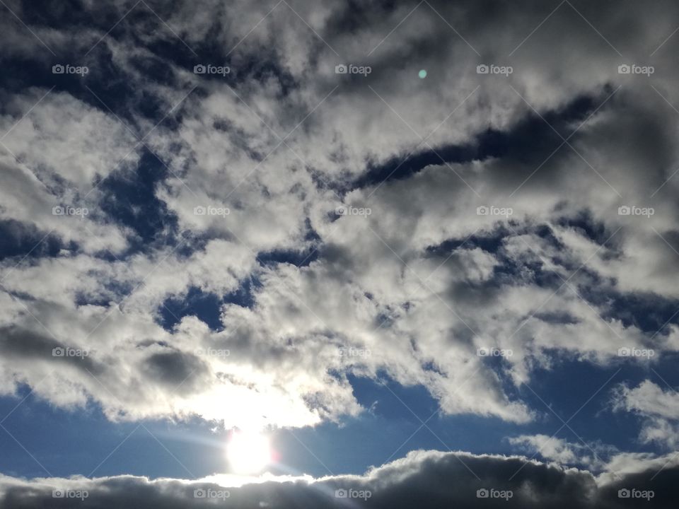 Sun with clouds