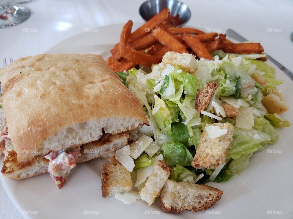 Lobster sandwich with salad