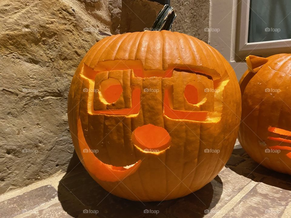 Pumpkin carving with glasses for halloween