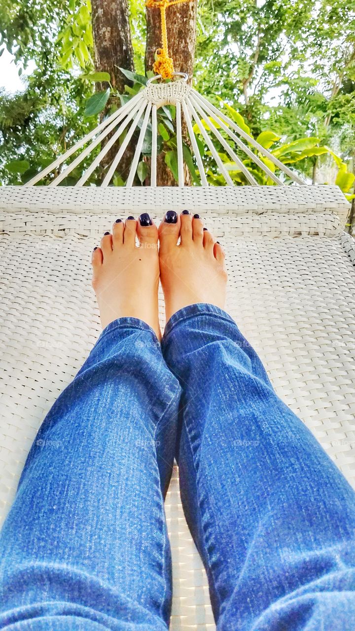 relaxing and swinging on a hammock