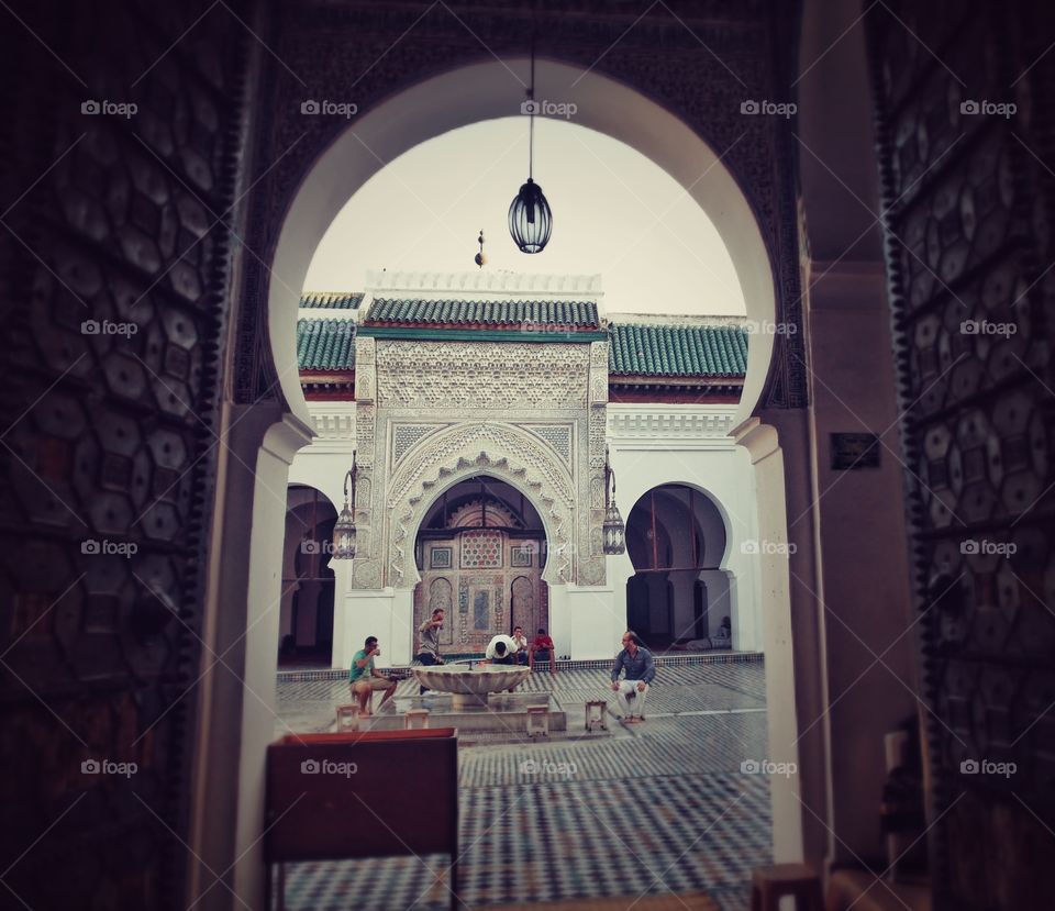 The ablution. Across this gate, is the wudu ("ablution") area, where Muslims wash their hands, face, feet, etc., before they pray.