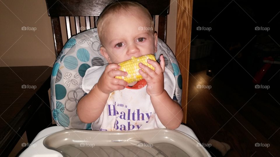 teether. first time eating corn on the cob