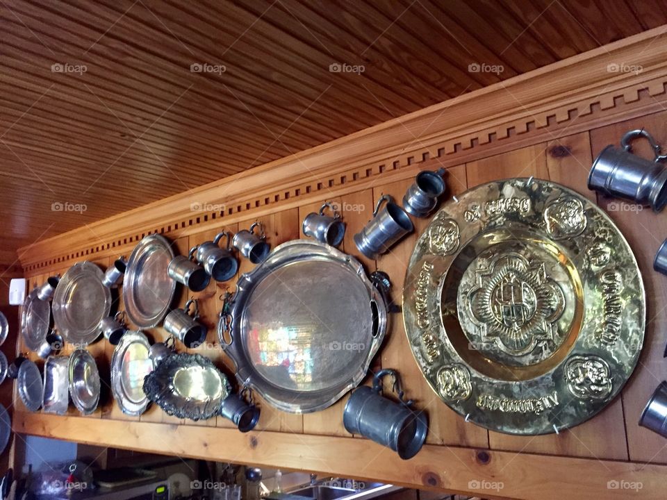 Rustic silver hanging on a wall 