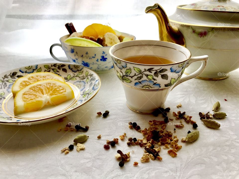 Close-up of teapot with tea cup