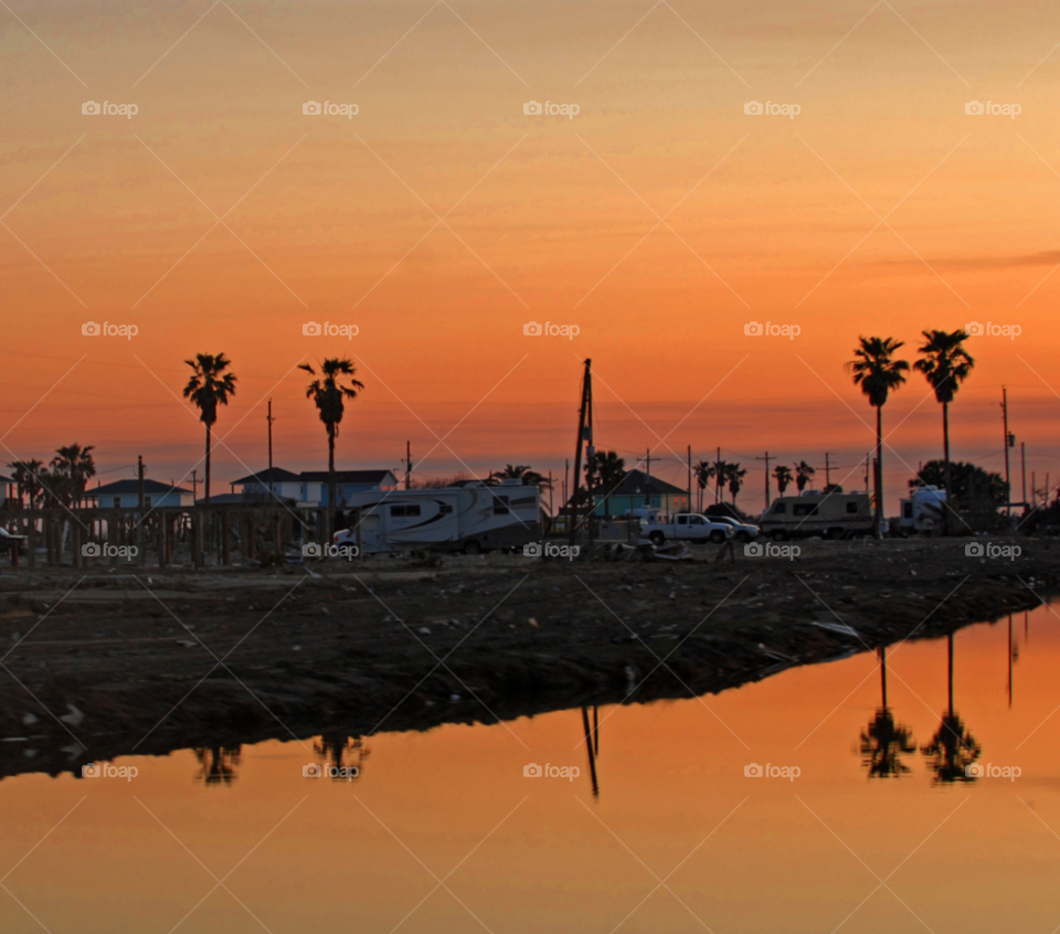 sunset reflection palmtrees by lightanddrawing