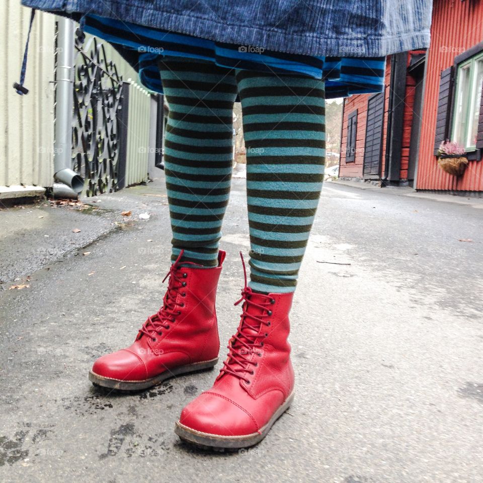 stripey legs in red boots