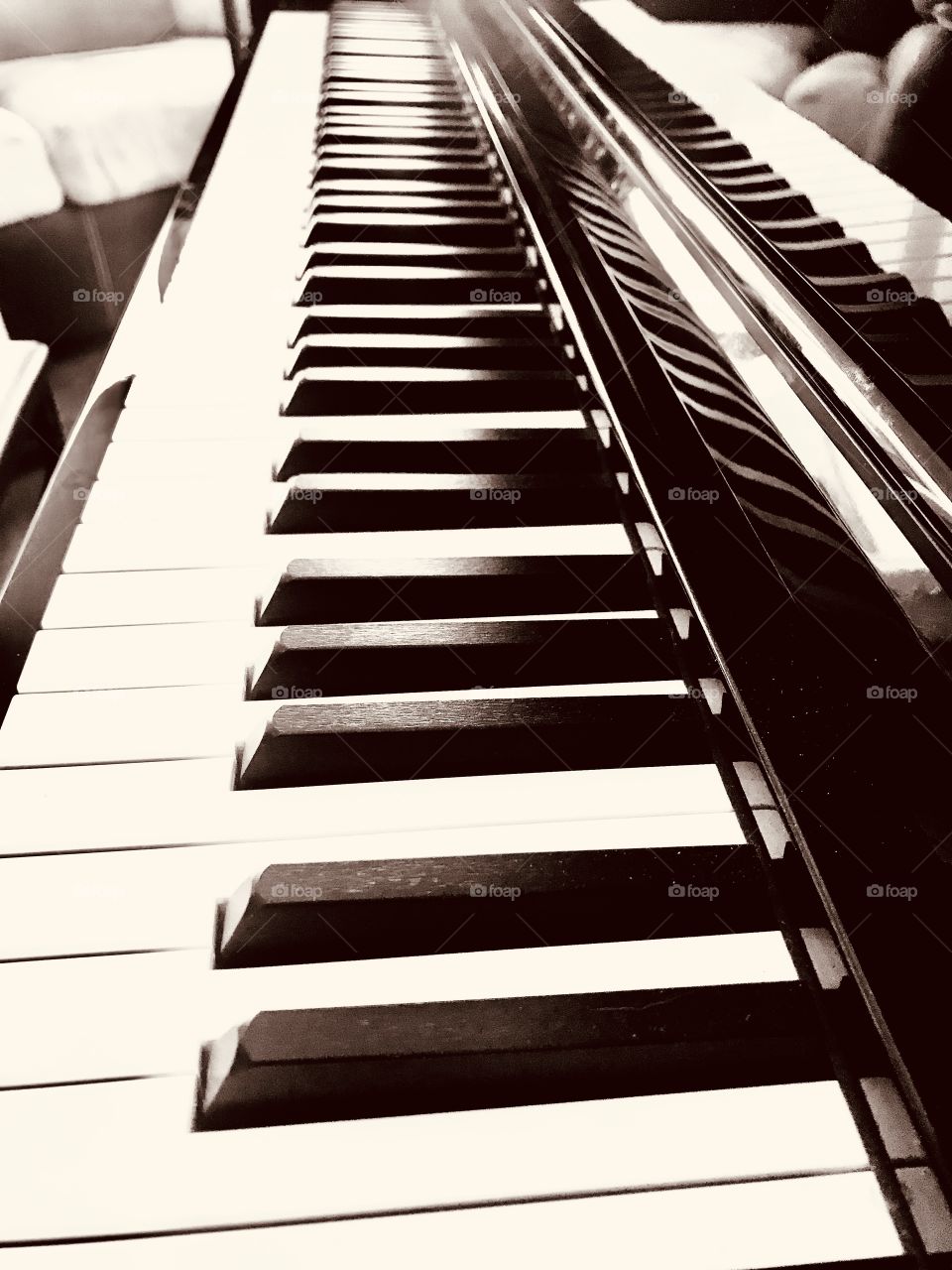 Gorgeous black and white rectangular piano keys make for sleek and beautiful photo! 