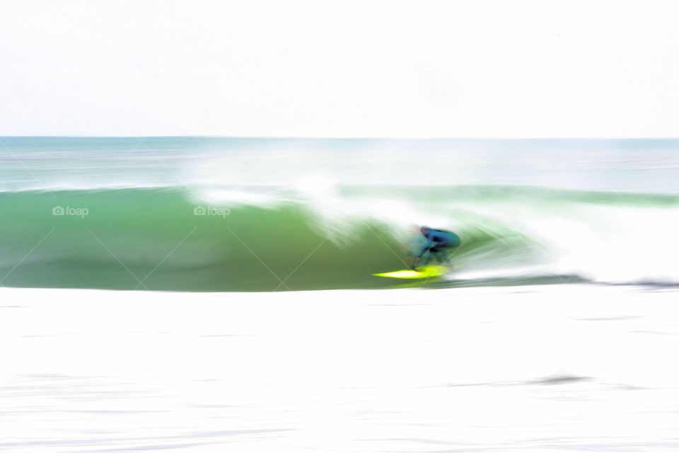 Surfer Ano Ñuevo beach CA