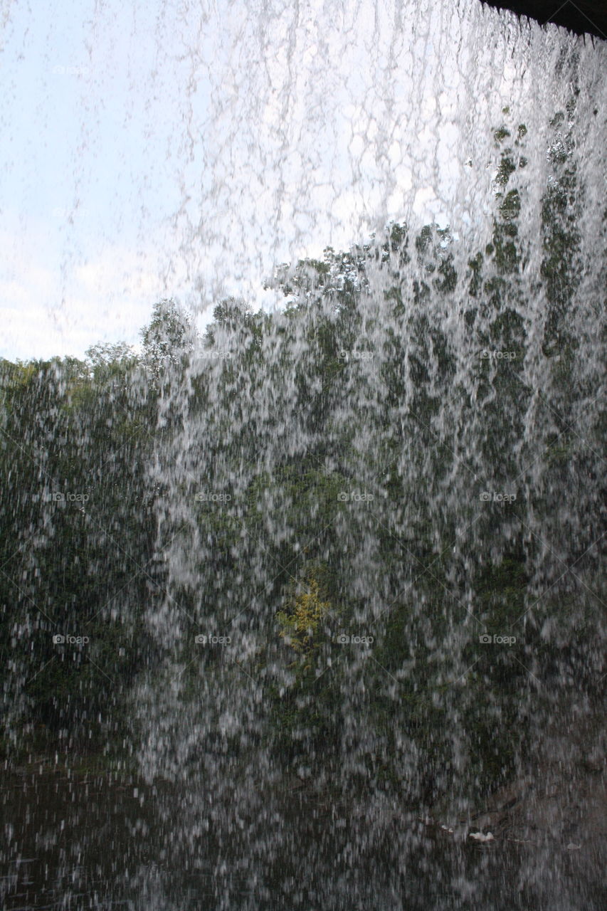 Behind the waterfall