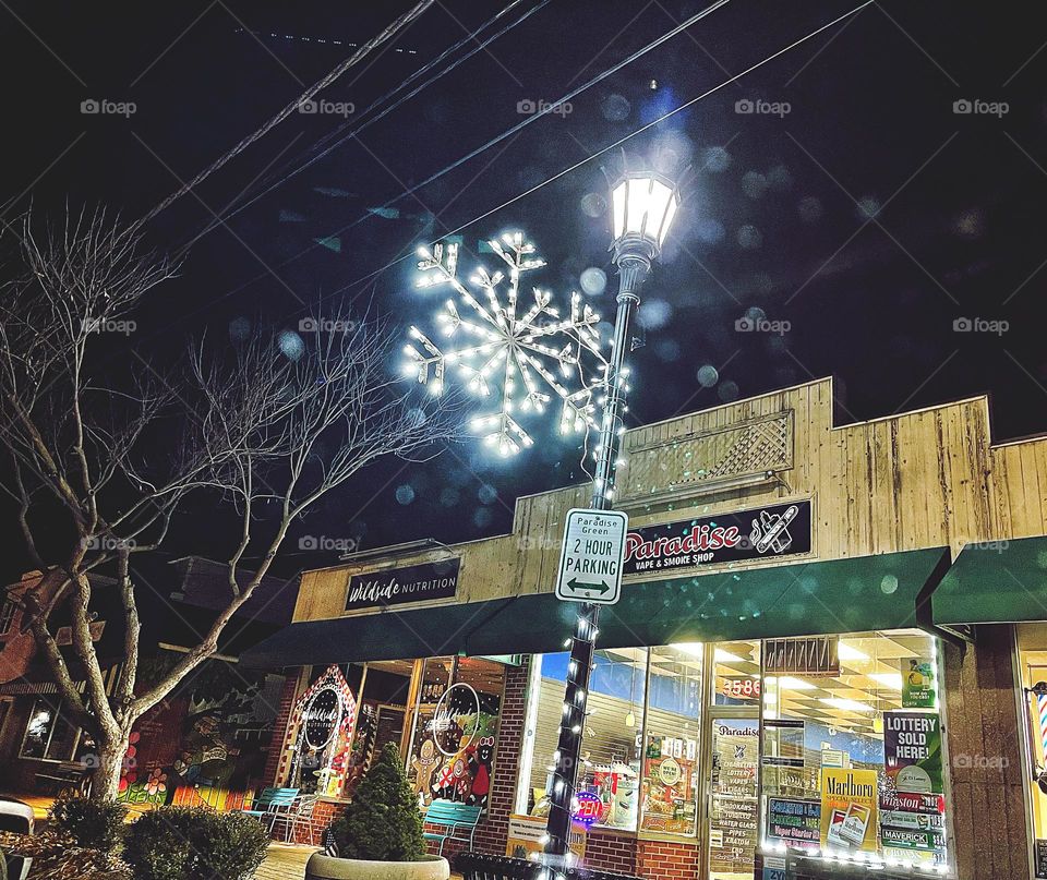 Christmas lights on a lamppost.. 