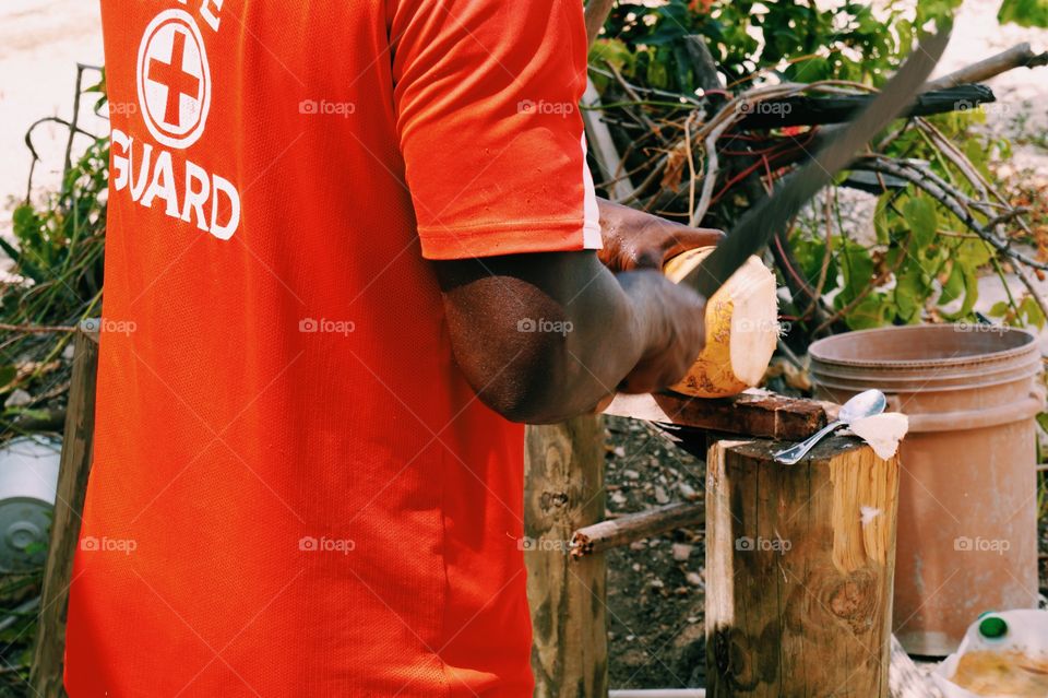 Cutting coconuts for drinks