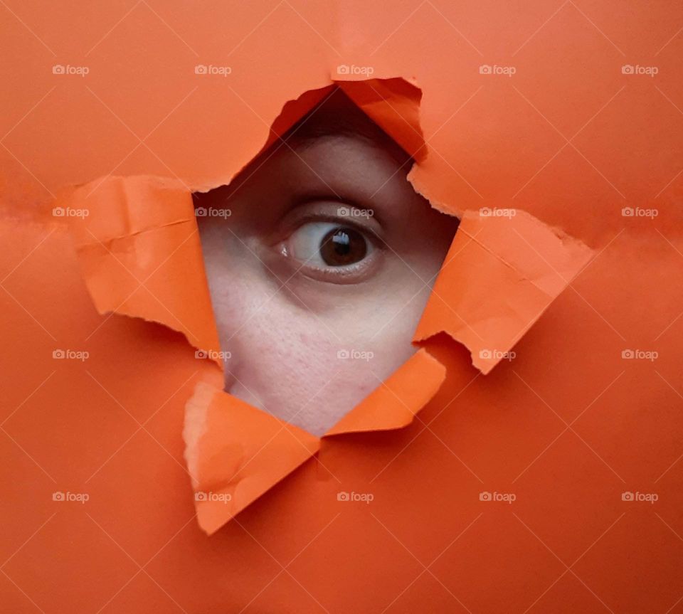 Portrait of a peeping eye that saw something terrible