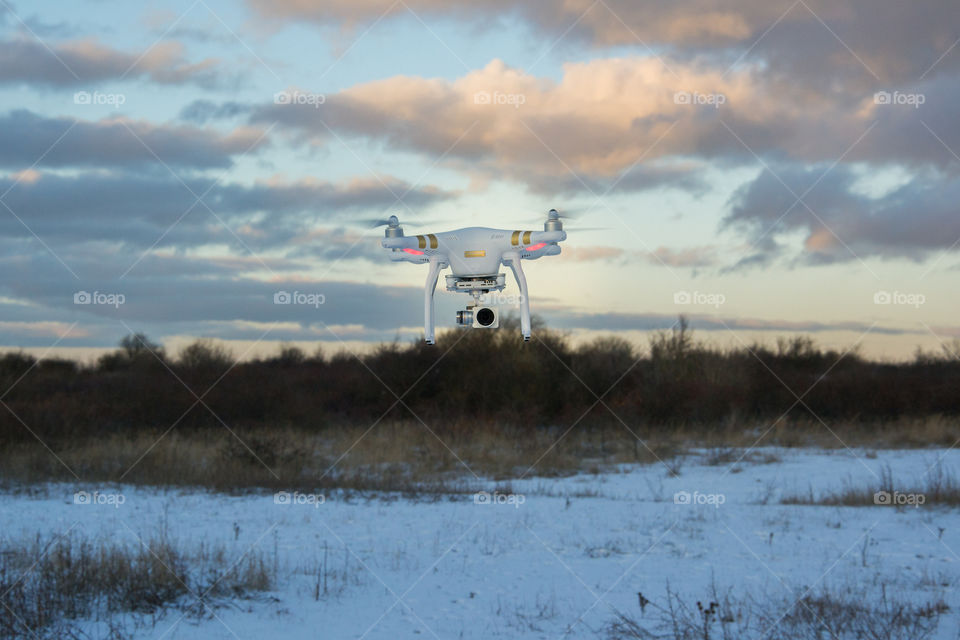 Phantom drone in the air taking pictures.