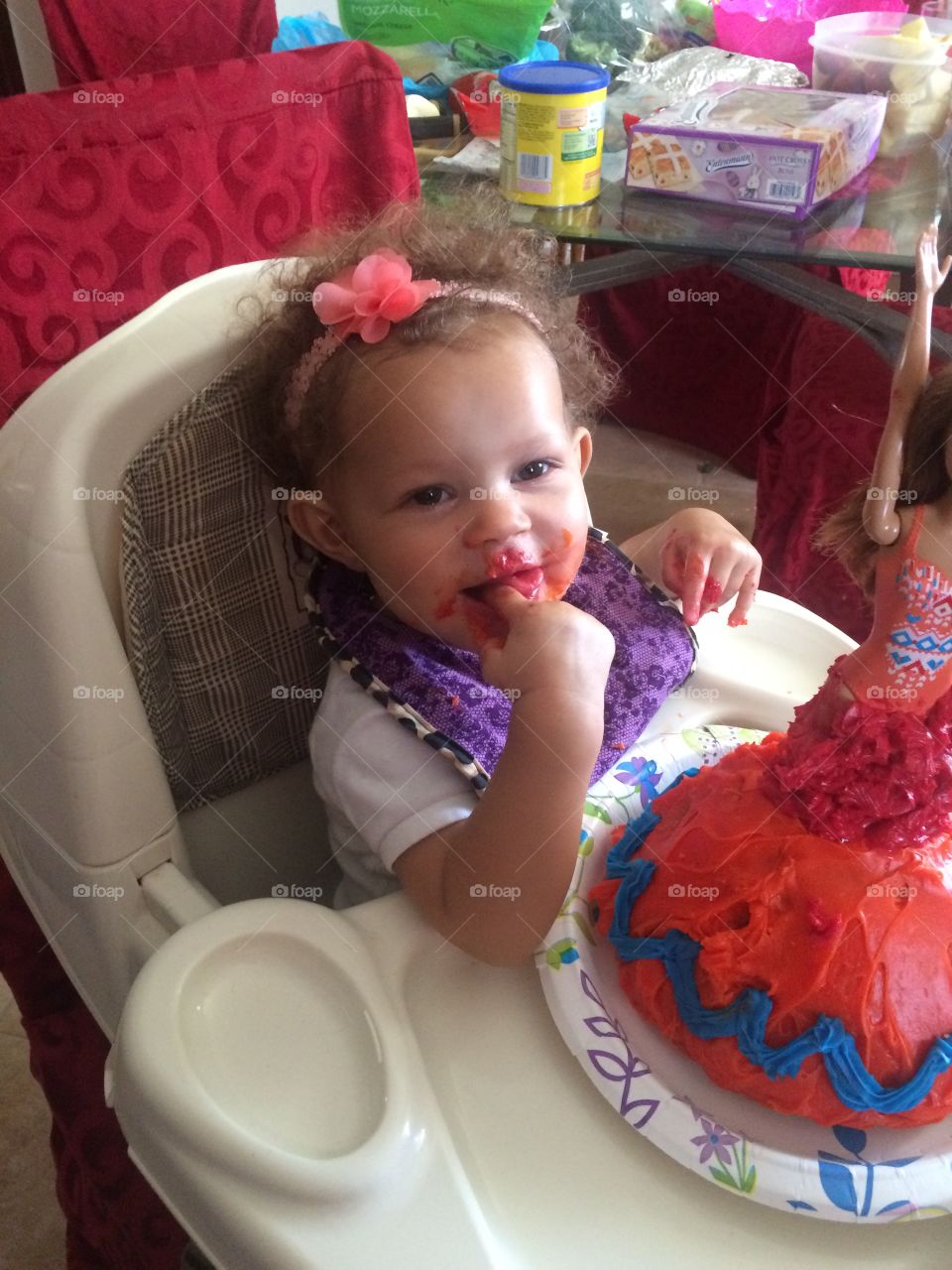Baby enjoying birthday cake 