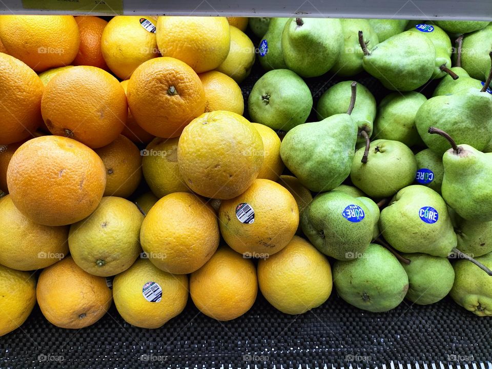 a mix of oranges and pears