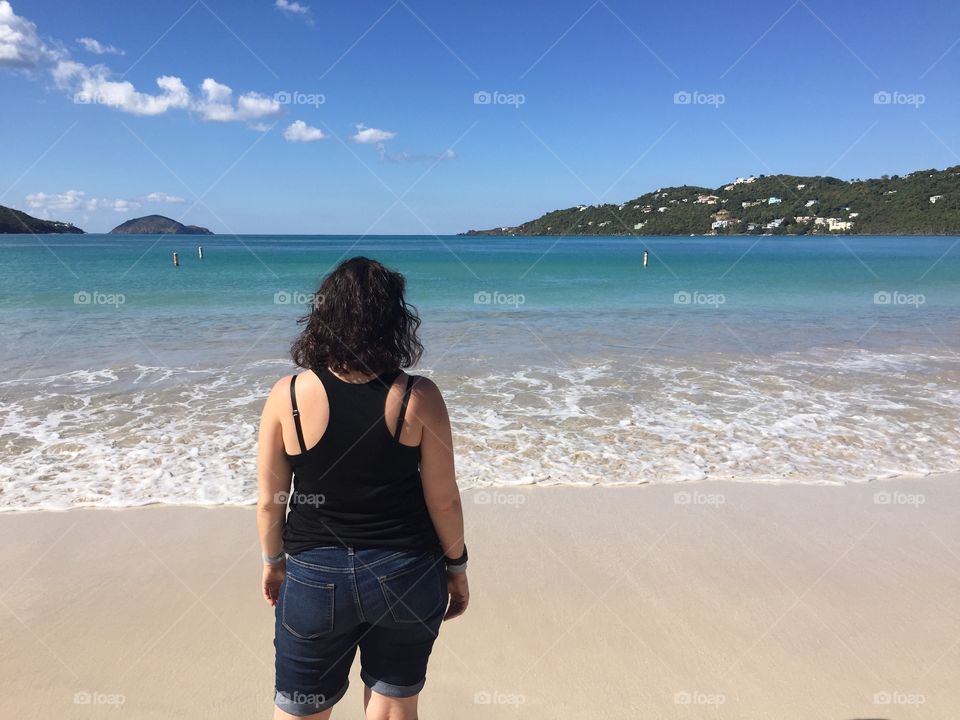 Girl looking off into paradise 
