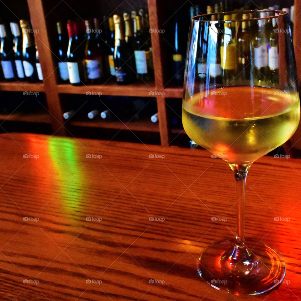 A glass of white wine.