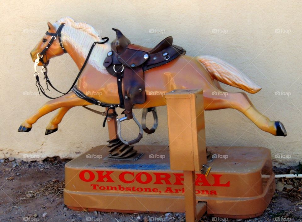 Giddy up. Coin horse at the OK corral