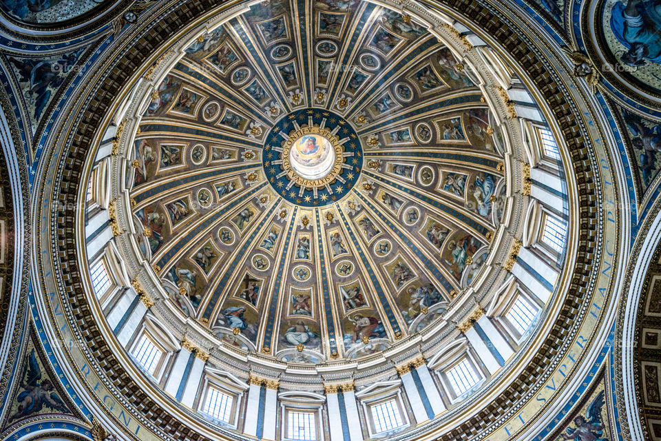 Ceiling in St. Peter's . Beautiful ornate ceiling in St. Peter's basilica taken in Rome Italy