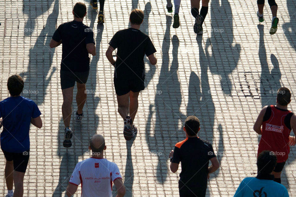 runners shadows men running by ventanamedia