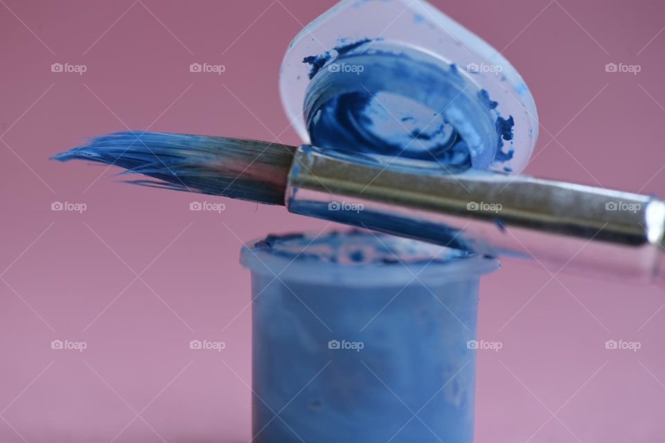 Open container of blue paint