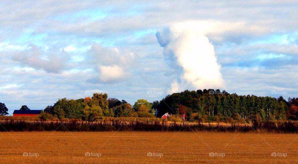 View of landscape against cloudy sky