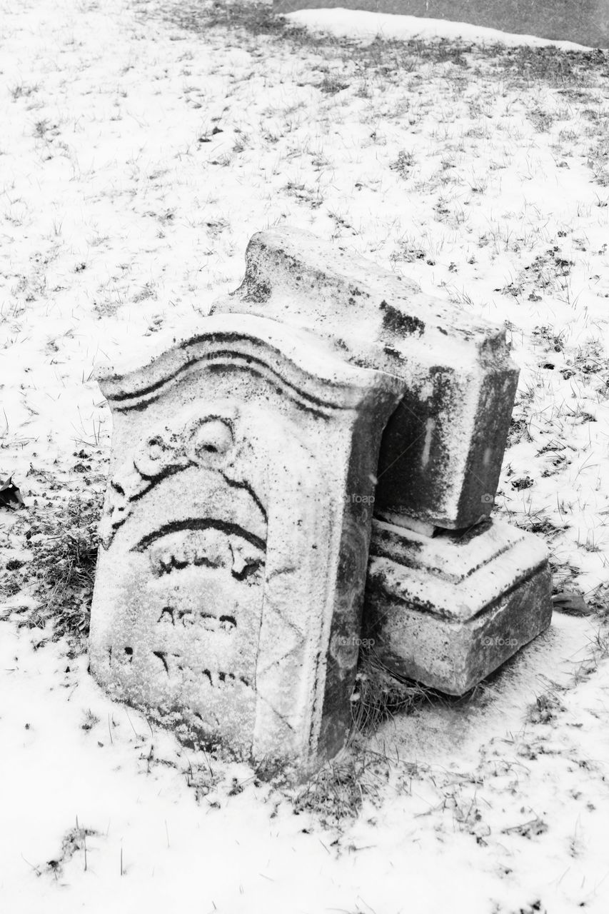 broken tombstones