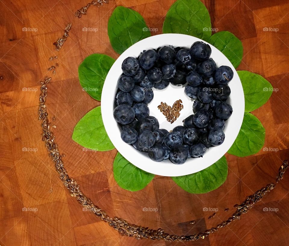 Blueberries and flax seeds on plate