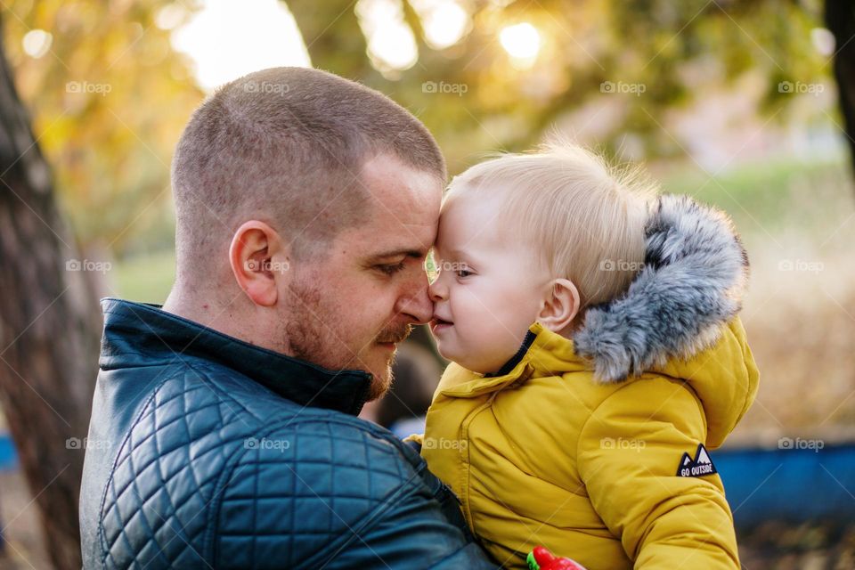 Father and daughter in autumn