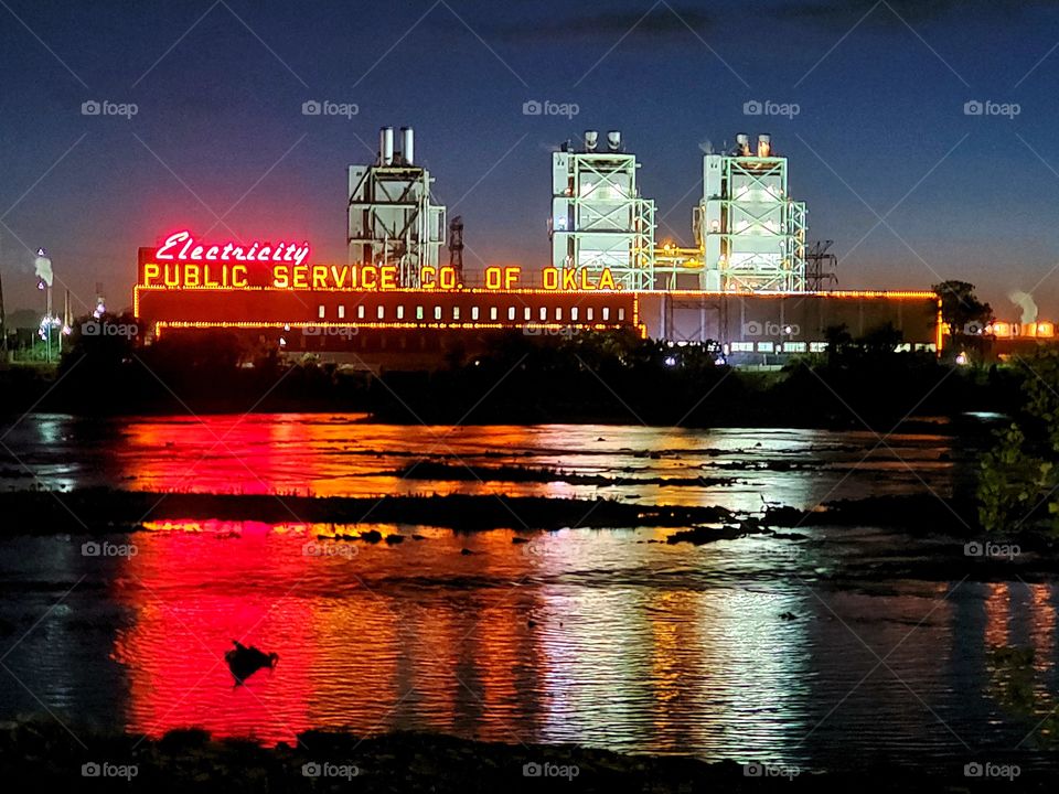The electric company in Tulsa Oklahoma looks impressive from across the Arkansas River with it's stunning light display
