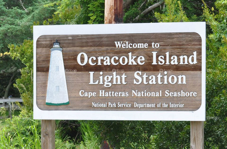 sign for Ocracoke lighthouse. Ocracoke Island Light Station at  Cape Hatteras National Seashore