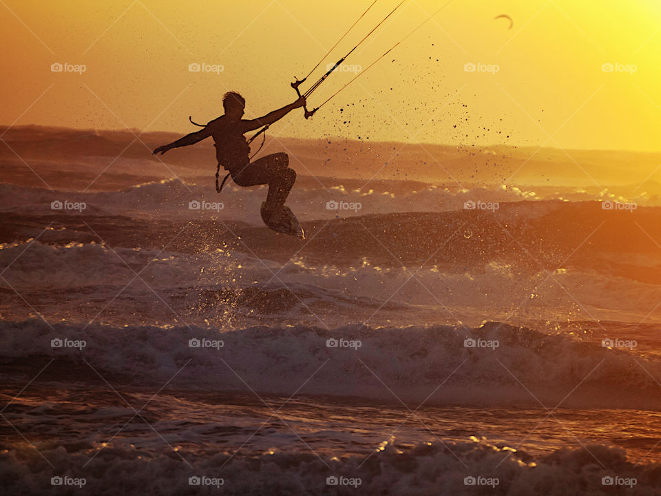 Surfer at sunset