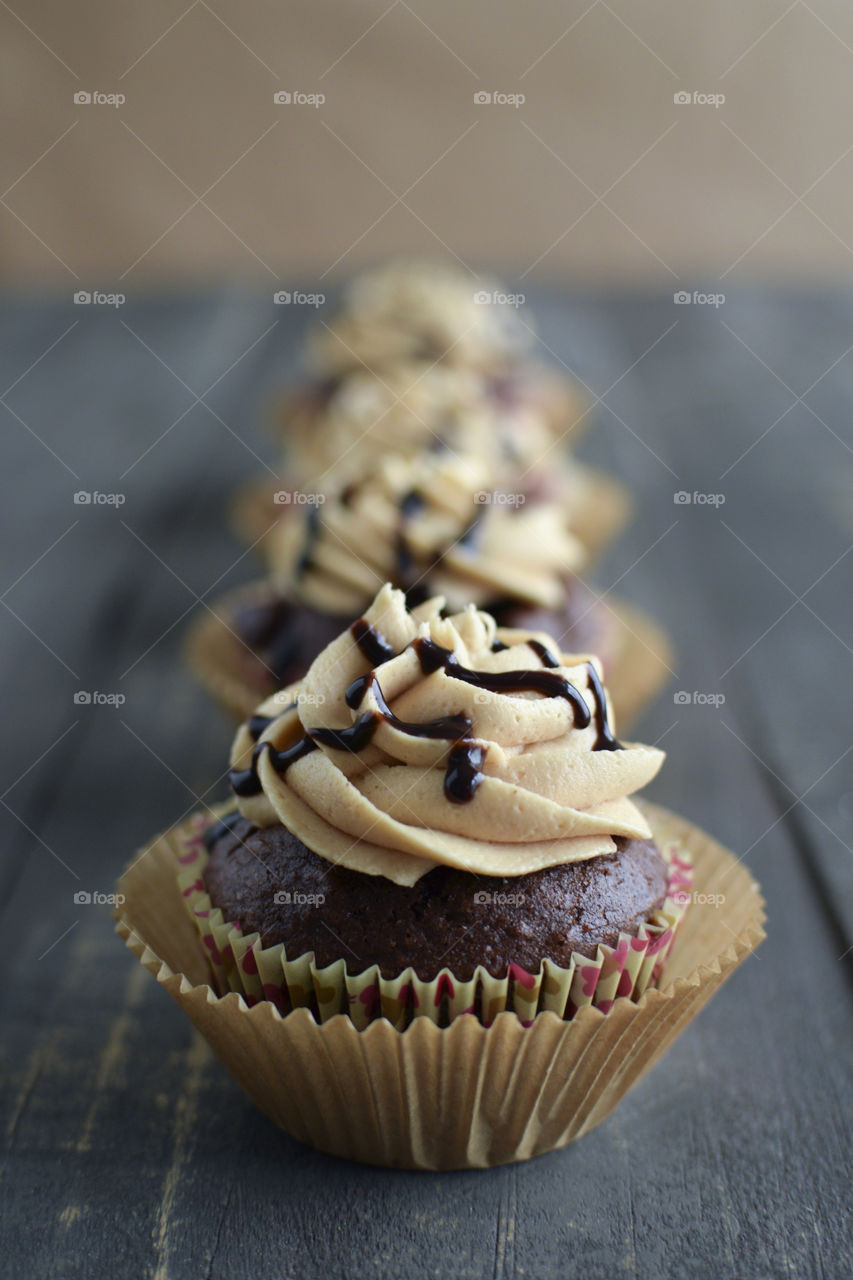 A Row of Chocolate Peanut Butter Cupcakes 