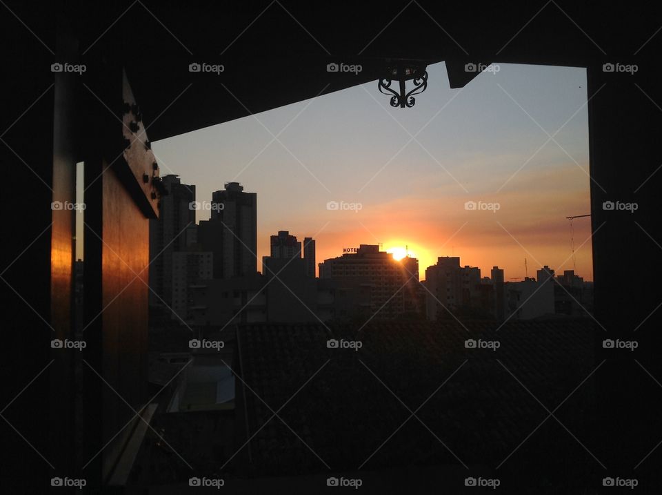 Sunset by the window. Amazing view to the sunset in my hometown... 