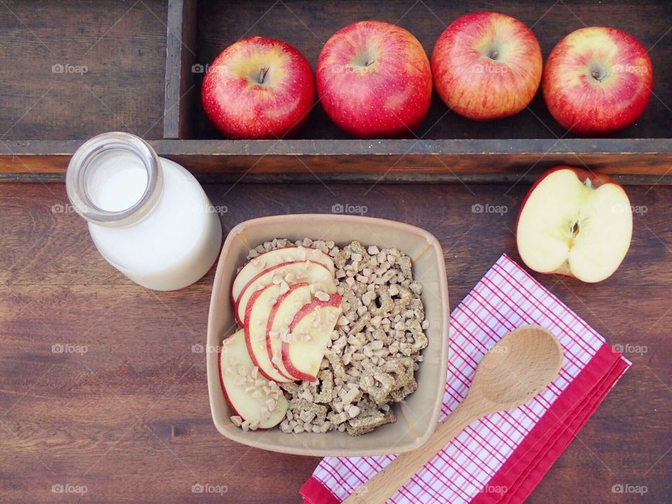 Cereal with apples and milk