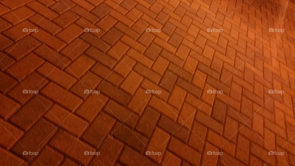 Bricks. While taking an evening walk, encountered this warm evening glow on bricks.