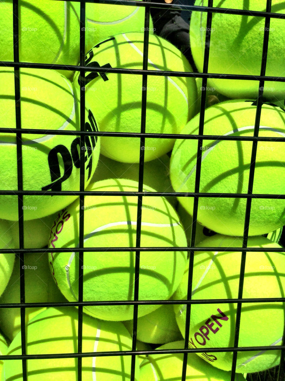 Tennis balls in a basket