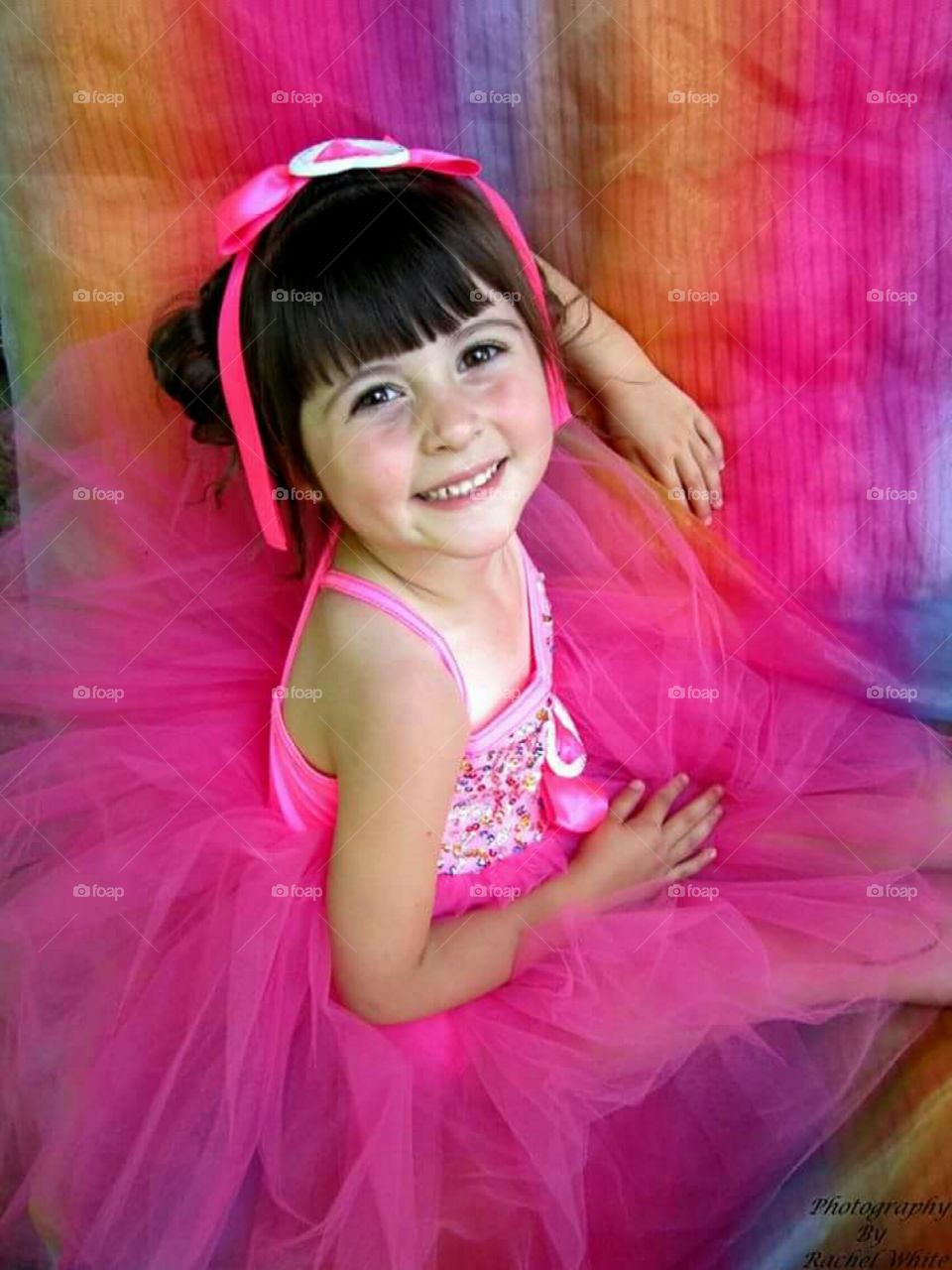 Little girl dressed for dance recital with a smile