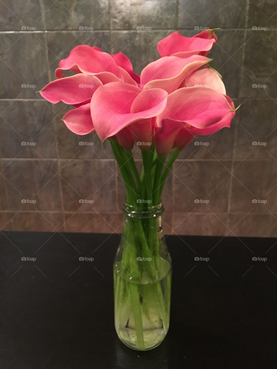 Lilies in milk bottles