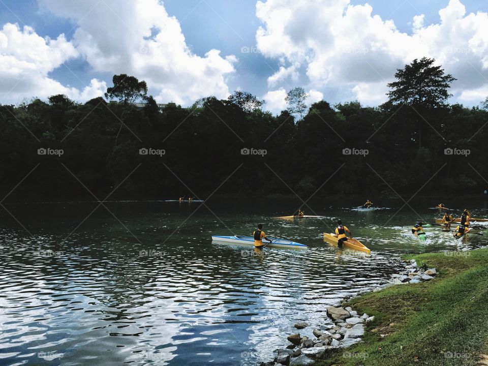 Kayaking in the clear river 