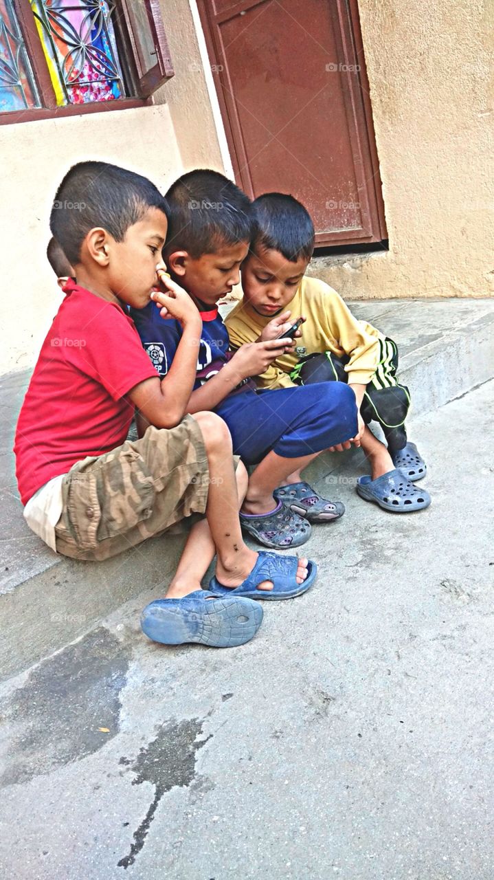 Children's playing game on mobile